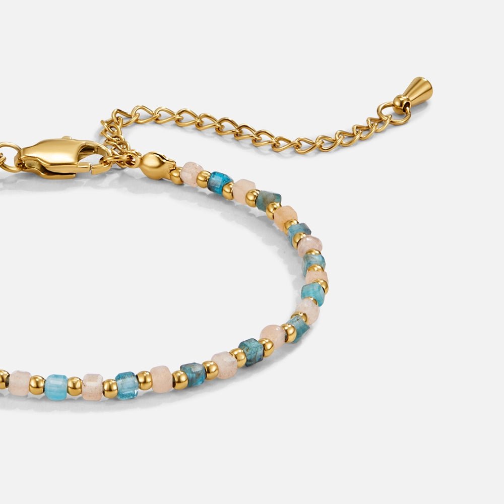 Alashan Blue Bead Bracelet, close-up of beaded bracelet with gold clasp and extender chain